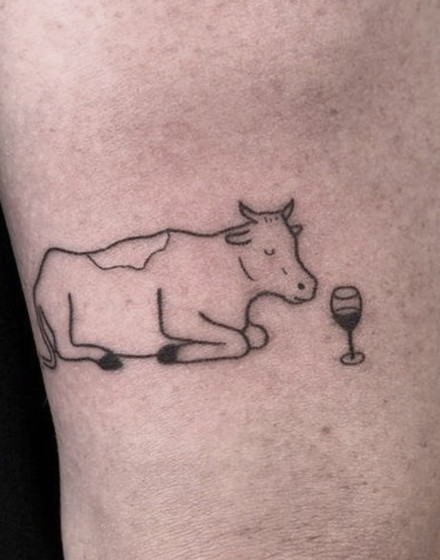 Minimalistic Cow Tattoo