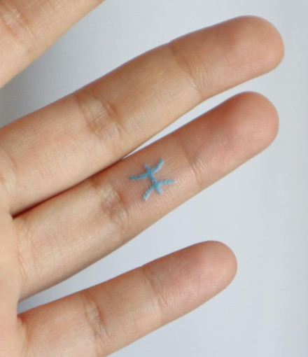Minimalistic Embroidery Tattoo