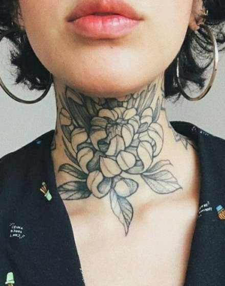 female neck tattoo