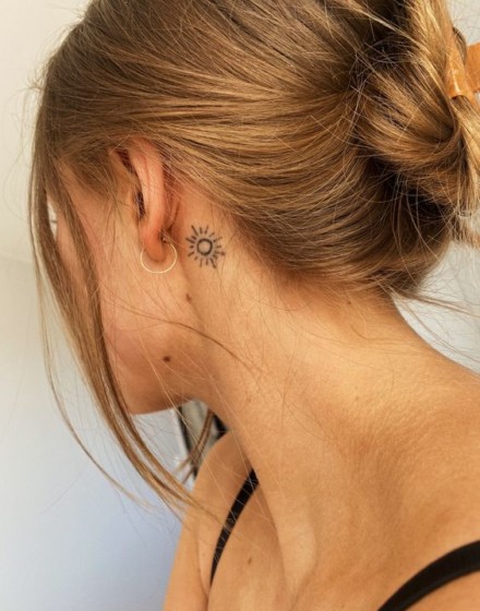 female neck tattoo
