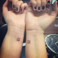 Matching tattoos for twins