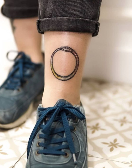 Minimalist Ouroboros Tattoo
