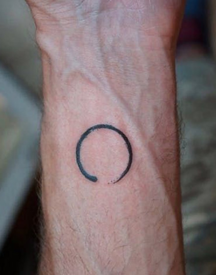 Minimalist Ouroboros Tattoo