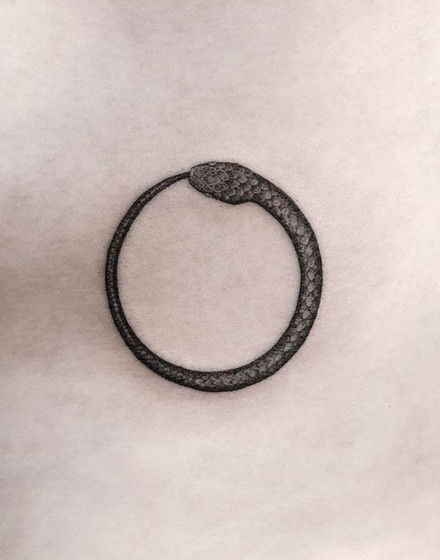 Minimalist Ouroboros Tattoo