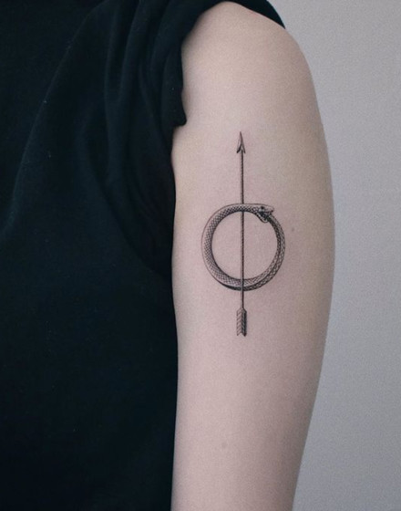 Minimalist Ouroboros Tattoo