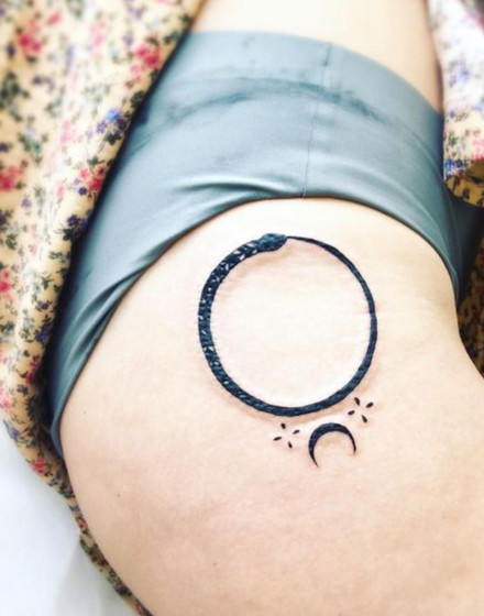 Minimalist Ouroboros Tattoo