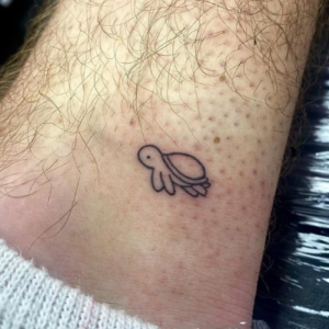 Small turtle tattoo
