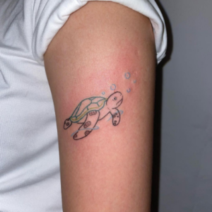 Colorful turtle tattoo