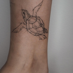 Geometric turtle tattoo