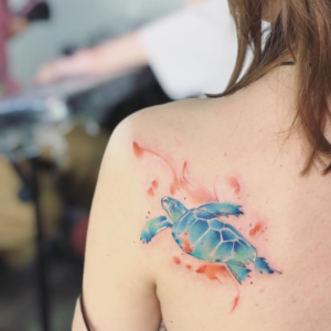 Colorful turtle tattoo