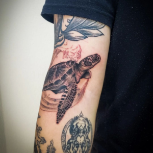 Realistic 3D turtle tattoo