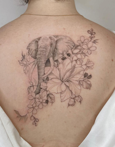 Elephant Tattoo With Flowers