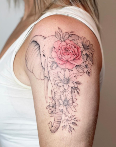 Elephant Tattoo With Flowers