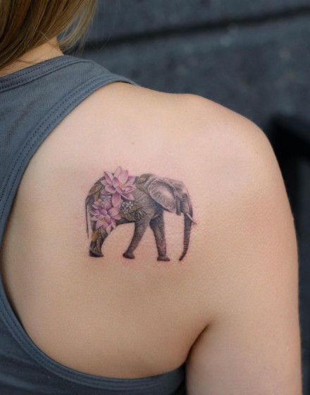 Elephant Tattoo With Flowers