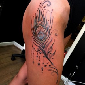 The tattoo of a peacock's Feather