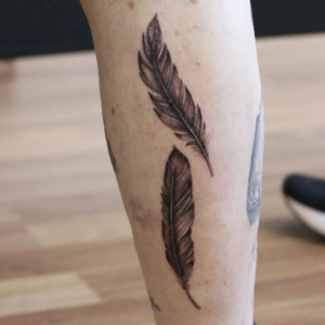 Tattoo Designs With Two Feathers