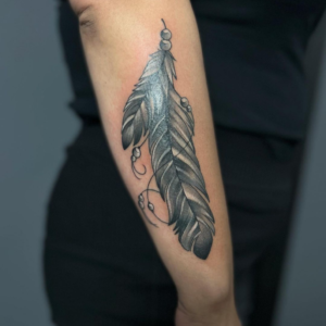Tattoo Designs With Two Feathers