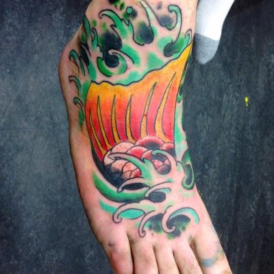 Foot tattoo by Eddy Deutsche