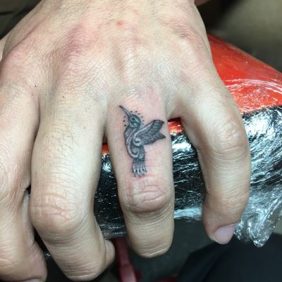 Fingers tattoo by Chamuco Cortez