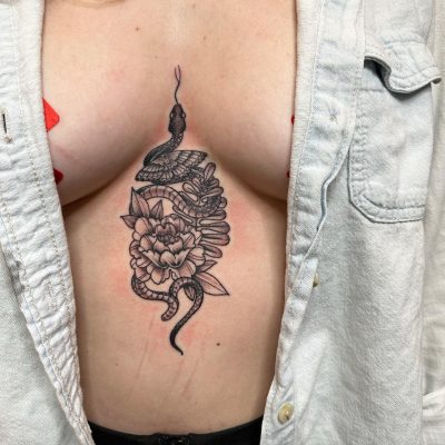 Sternum tattoo by Ray Schmoldt