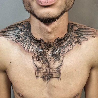 Collar bone tattoo by Julio Roslindo