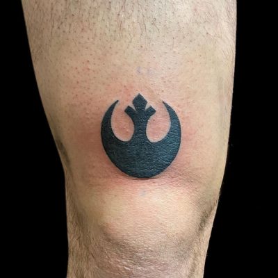 Knee tattoo by Jake Olson