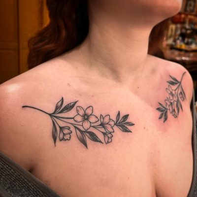 Collar bone tattoo by Ireland Egan