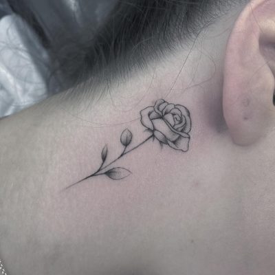 Ear tattoo by Joe