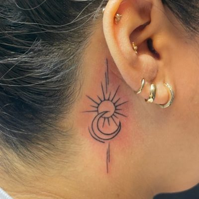 Ear tattoo by Adel Orozco