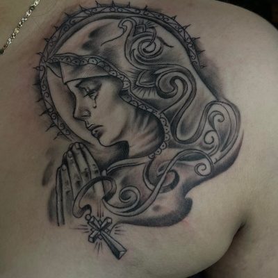 Collar bone tattoo by Los Mendoza