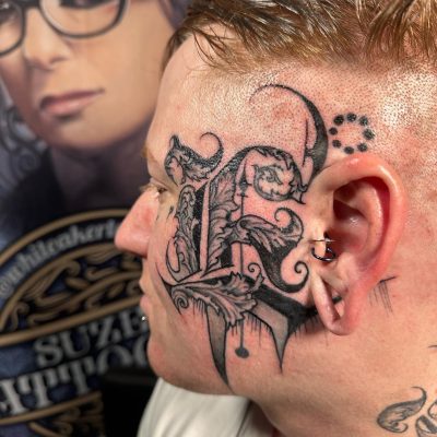 Face tattoo by Suzen Tattoozen