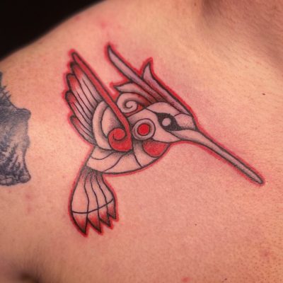 Collar bone tattoo by Carlos Roa