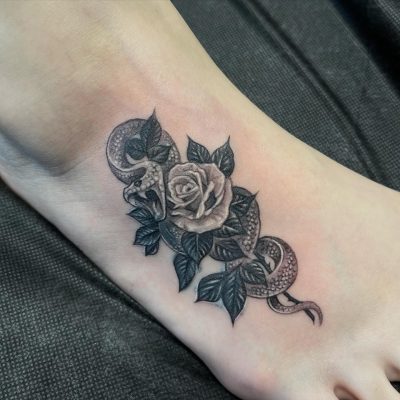 Foot tattoo by Git