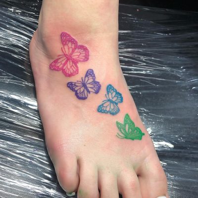 Foot tattoo by Justin Walker