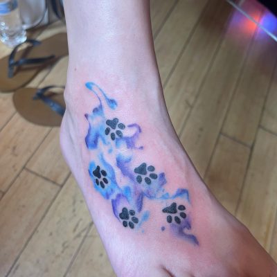 Foot tattoo by Quiz Parker