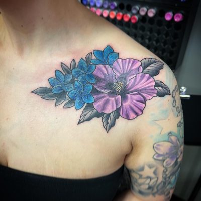 Collar bone tattoo by [Name of tattoo artist]