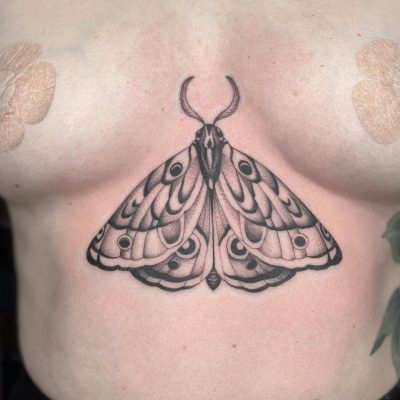 Sternum tattoo by Brian Leebrick