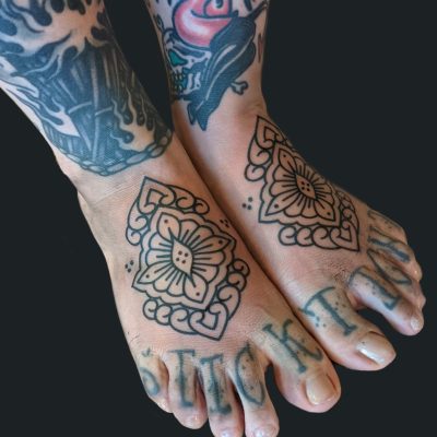 Foot tattoo by English Nye Cousins