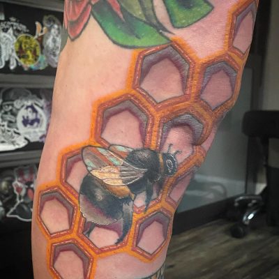 Knee tattoo by Mel Stone