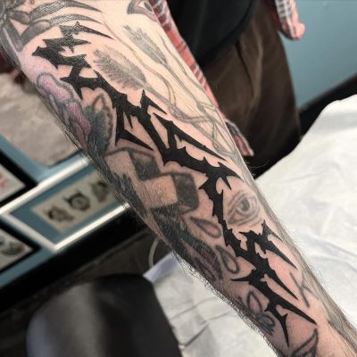 Tribal tattoo by Jake Rodriguez
