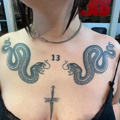 Collar bone tattoo by Casey Leanza