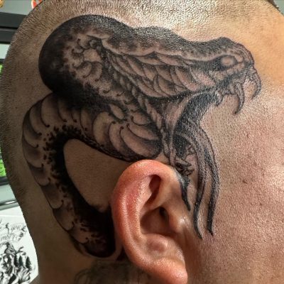 Head tattoo by Carlos Cordova