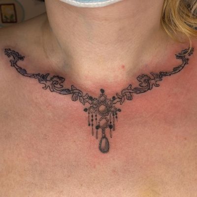 Collar bone tattoo by Ever Stylinson