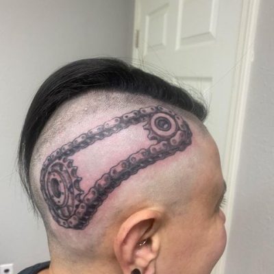 Head tattoo by Paul Thomas