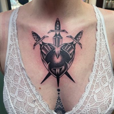 Sternum tattoo by Kevin Onley