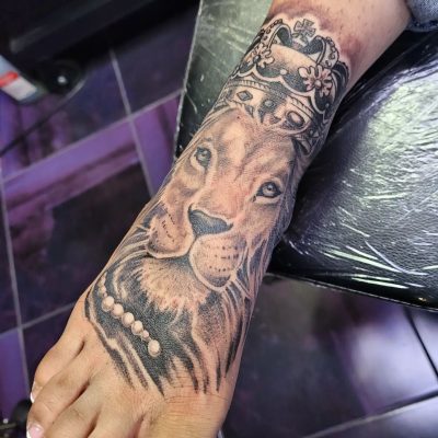 Foot tattoo by Ab Zavala