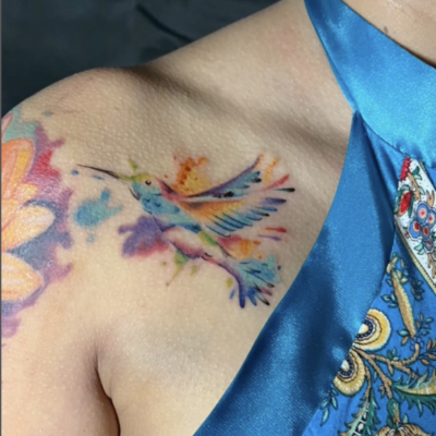 Collar bone tattoo by Lawn L Lewis