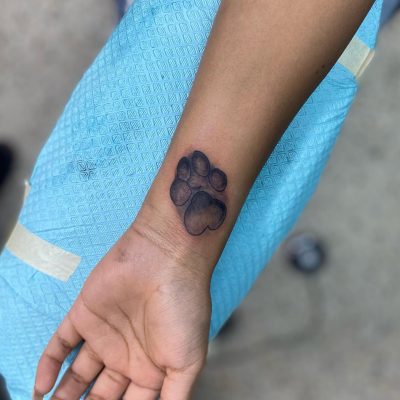 Wrist tattoo by Ryan Loupe
