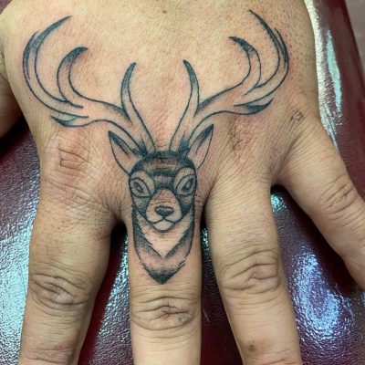 Fingers tattoo by Eddie Wolfe