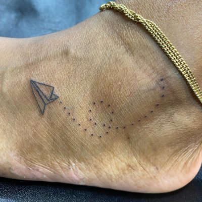Foot tattoo by Paul Jordan